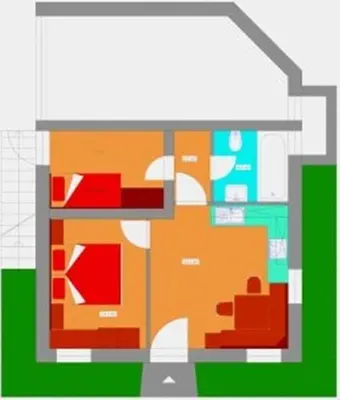 a floor plan of a house with furniture at Appartamenti Loega in San Cassiano