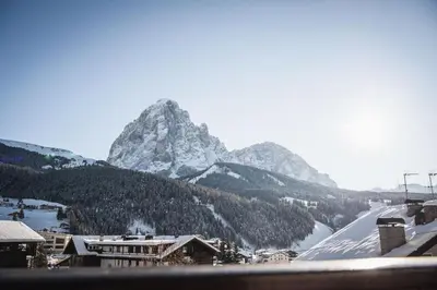 a view of a mountain with snow on the ground at Apartments Chalet Zirm in Santa Cristina in Val Gardena