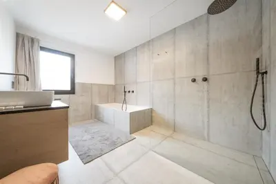 a bathroom with a shower and a sink at Apartments Carmen in Ortisei