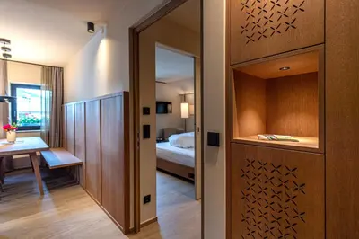 a room with a door leading to a bedroom at Apartments Am Platzl Living in Laion
