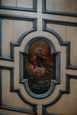 a painting on the wall of a building at der Paterhof- wohnen in historischen Mauern in Pianizza di Sopra