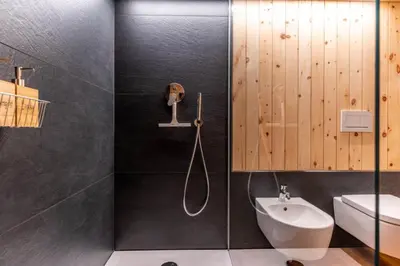 a bathroom with a shower and a sink at Chalet alla Perla, Grumes in Grumes