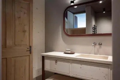 a bathroom with a sink and a mirror at Rappersbühl in Collalbo