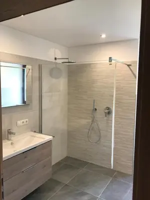a bathroom with a shower and a sink at Ottohof - Morgenrot in Brennero