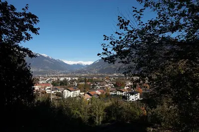 a view of a city with mountains in the background at Stadler Hof in Lana