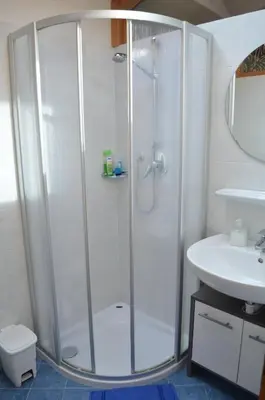 a bathroom with a shower and a sink at Gruberhof in San Genesio Atesino