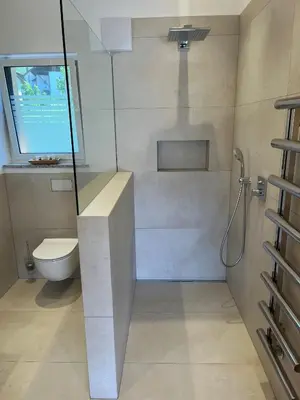 a bathroom with a shower and a toilet at Ferienhaus im Grünen in Terlano