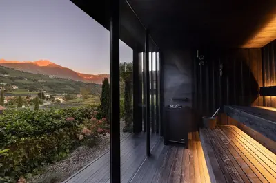 a house with a view of the mountains at Residence Der Heinrichshof in Lagundo