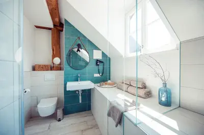 a bathroom with a sink and a toilet at Gschnoferhof Terlan in Terlano