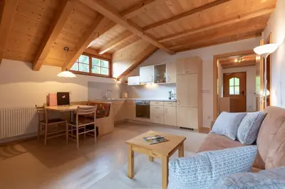 a living room with a couch and a table at Apartment Christian in Nova Levante
