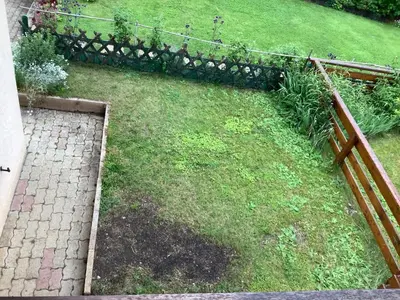 an aerial view of a yard with a fence at Passione Dolomiti in Romeno