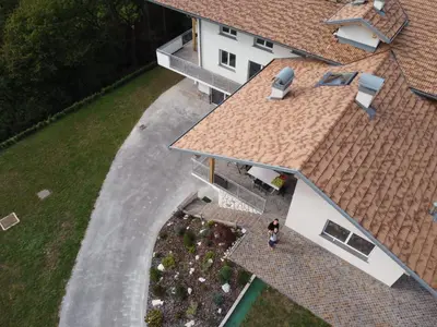 an overhead view of a house with a roof at Ciasa Erica - Val di Non in Predaia