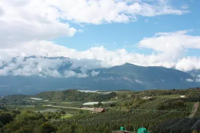 a view of a valley with a mountain in the background at Ciasa Erica - Val di Non in Predaia