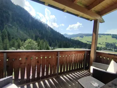 a balcony with a view of the mountains at romy's B&B in Braies
