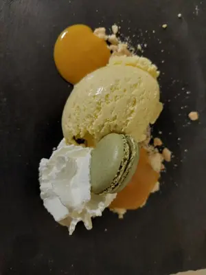 a dessert with a teddy bear on top of it at Albergo Scoiattolo in Tret