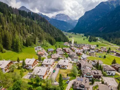 an aerial view of a small village in the mountains at Residenza al Villaggio in Mazzin