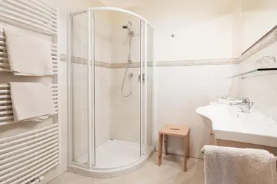 a bathroom with a shower and a sink at Leishof in Villandro