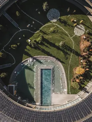 an overhead view of a circle with a door in the ground at OLM Nature Escape - Eco Aparthotel in Campo Tures