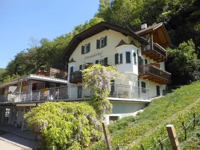 a building on the side of a hill at Ottenkellerhof in Bolzano