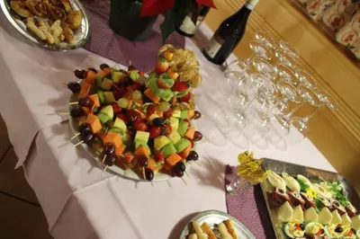 a plate of fruit in the shape of a heart on a table at Hotel Pörnbacher in Valdaora