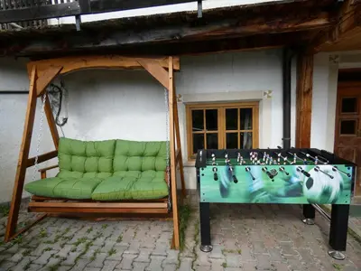 a group of chairs sitting under a gazebo at Casa Gogn in San Vigilio Di Marebbe