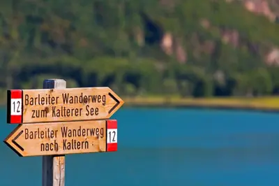 a wooden sign that says berrienwander istgsenal istgsenalfourth retriever at Residence Haus Kalterersee in Caldaro