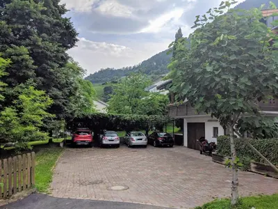 a group of cars parked in a driveway at Ferienwohnung Winklerhof in Lana