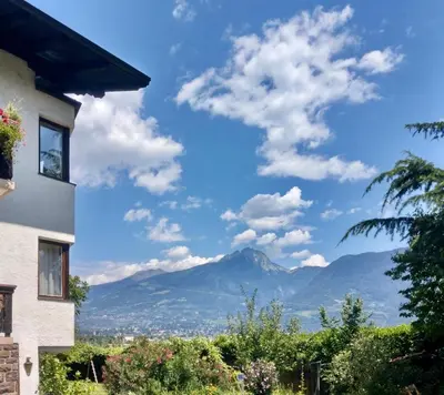 a view of a mountain from a house at Appartement Hortensia - Haus Midi in Marlengo