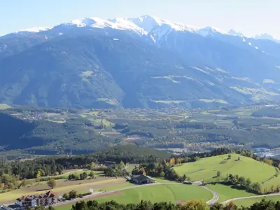 a view of a valley with mountains in the background at Parleitnerhof Ferienwohnung Abendrot in Mühlbach