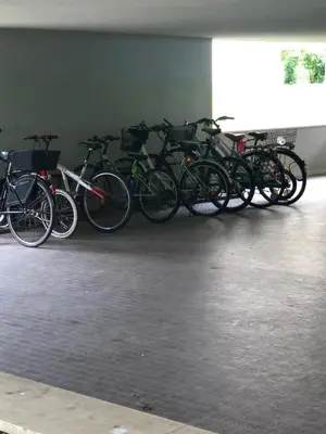 a group of bikes parked in a garage at Brunico 20 in Brunico