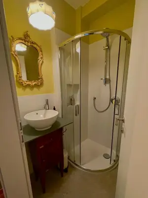 a bathroom with a shower and a sink at Brunico 20 in Brunico