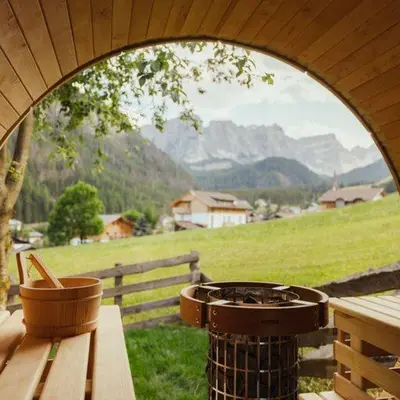 a grill sitting on a table with a view of a field at Ostí Vedl in San Martino in Badia