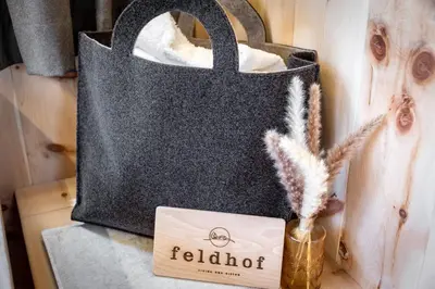 a black tote bag on a counter next to at Mountain Caravan - Zirben Nestl in Nova Ponente