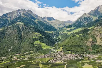 an aerial view of a valley in the mountains at Fruemess - Historic Refugium in Parcines