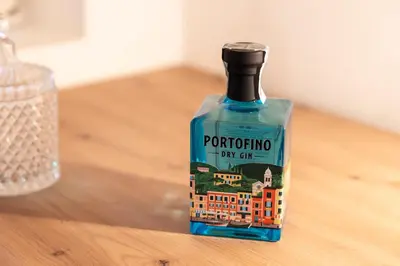 a bottle of alcohol sitting on top of a table at KARINA Mulino in Montagna