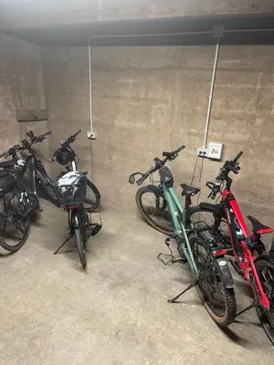 a group of bikes parked in a garage at Haus Käfersberg in Naturno