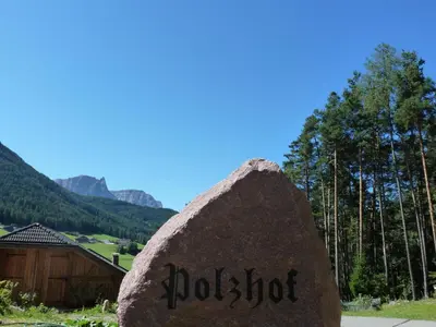 a rock with the word wolfot written on it at Polzhof in Castelrotto
