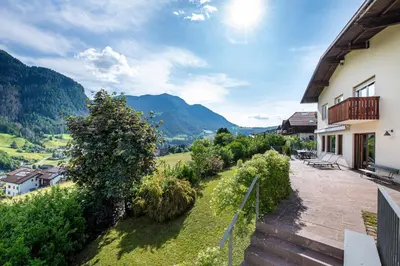 a view from the balcony of a house with mountains at Villa Vastle in Ortisei