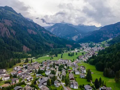 an aerial view of a village in the mountains at Villa Elisena in Falcade