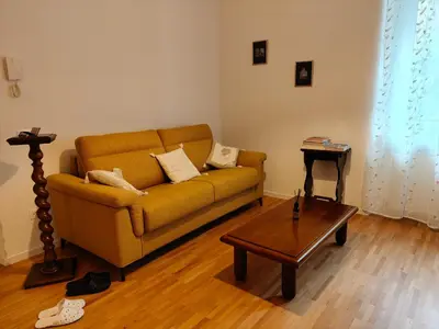 a living room with a couch and a coffee table at Jolli Mountain in Bolzano