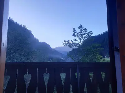 a view of a valley from a balcony at Appartamenti Nonno Gianni in Rocca Pietore