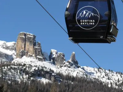 a gothia skiing sign on the side of a ski lift at Ciasa Vervei in Cortina dʼAmpezzo