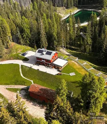 an aerial view of a house with a train at Ciasa Vervei in Cortina dʼAmpezzo
