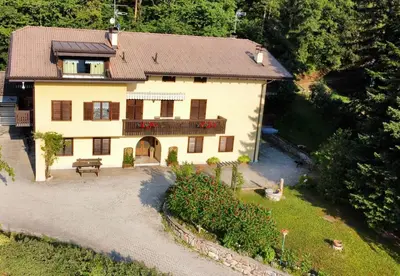 an aerial view of a house with a garden at Casa Corgol con vista lago e montagne in Predaia