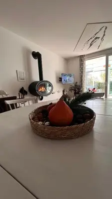 a basket of vegetables sitting on a counter in a kitchen at Garden Suite in Bolzano