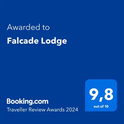 a screenshot of a cell phone with the text awarded to blanket lodge at Falcade Lodge in Falcade