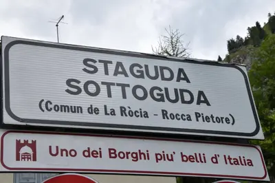 a sign for a street in a foreign language at Staguda 59 in Sottoguda