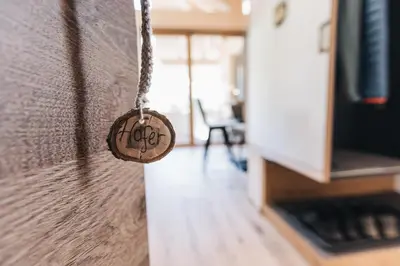 a tag that says hope hanging on a wall at Flaschtal-Hof in Nova Ponente