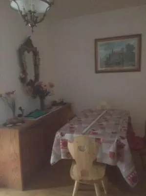 a room with a table with a table cloth at BIS Vipiteno in Vipiteno