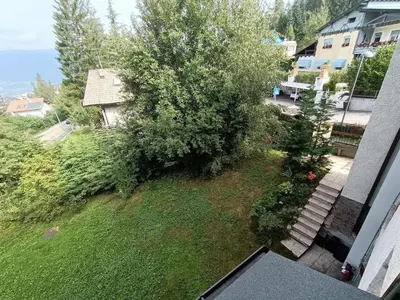 an aerial view of a yard with a tree at Resort CuraLibera in Ronzone